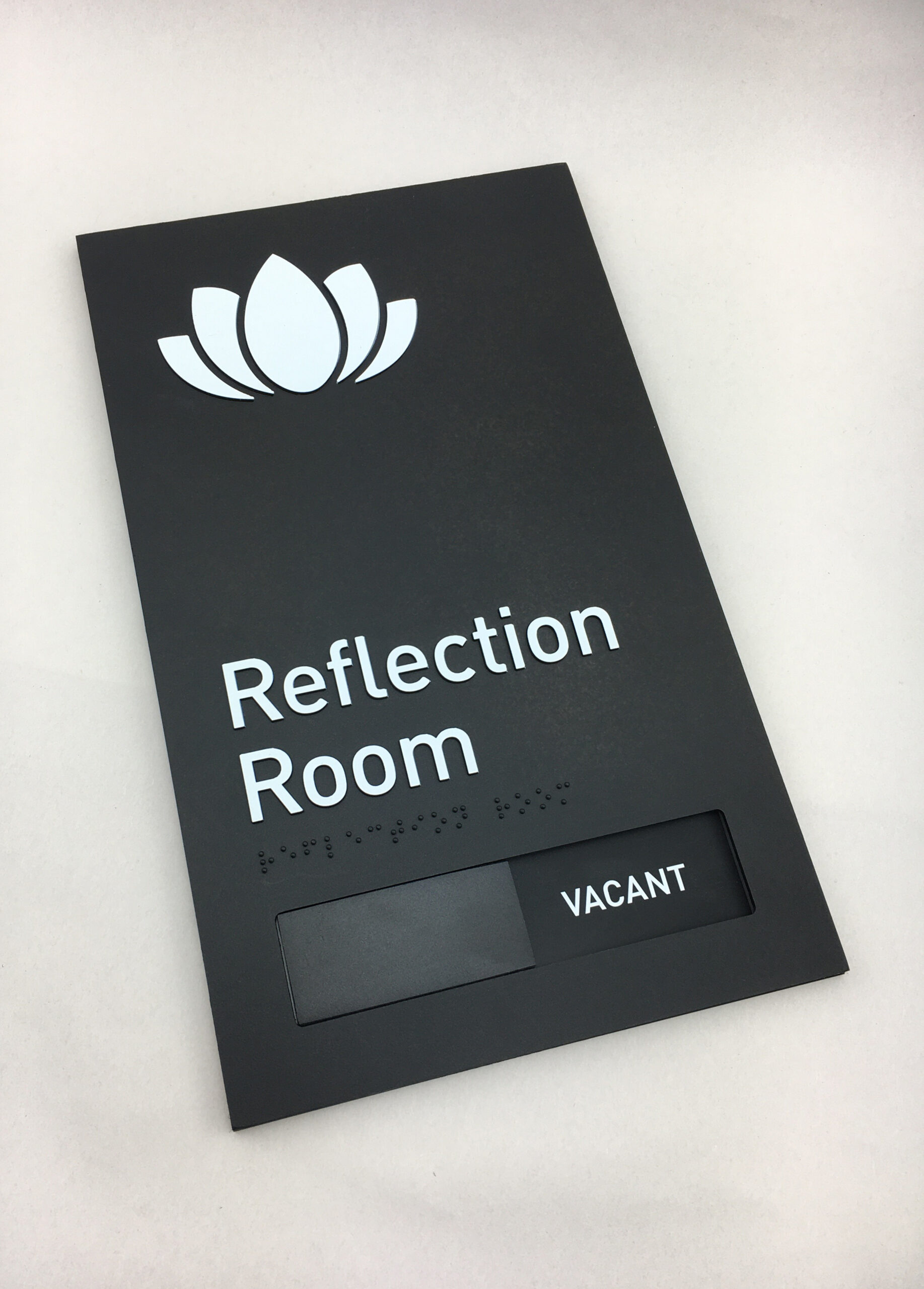 Custom Moulded Acrylic Braille Sign with integrated Slider