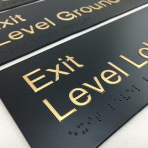 Exit Level Braille Signs Black with Brass raised Text