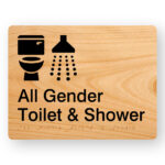 All Gender Toilet & Shower Braille Sign in Woodgrain Acrylic. Woodgrain Sign panel with black toilet & Shower symbol, text reads All Gender Toilet & Shower