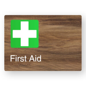 First Aid Braille Sign in a Mid-Tone Woodgrain - Image 1