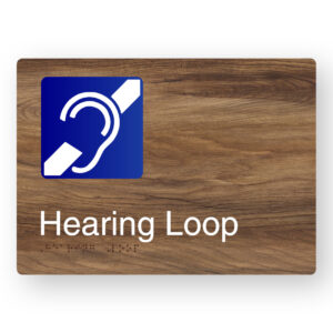 Hearing Loop Braille Sign in a Mid-Tone Woodgrain