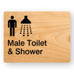Male Toilet & Shower Braille Sign in Woodgrain Acrylic. Woodgrain Sign panel with Black Male & Shower Symbol. Black Text reads Male Toilet & Shower. Braille Text is Shown
