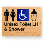 Unisex Accessible Toilet LH & Shower Braille Sign in Woodgrain Acrylic. Woodgrain colour panel with black Male, Female, Accessible & Shower symbols.