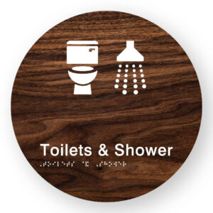 Toilets & Shower Braille Sign on a Tactile Printed Dark Woodgrain Acrylic Disk - Image 1