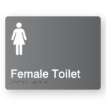 Female Toilet Braille Sign, grey sign panel with white female symbol & text that reads Female Toilet