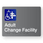 Adult Change Facility Braille sign in Grey Acrylic. Grey Sign panel with Blue & White Changing places Symbol & White text that reads Adult Change Facility