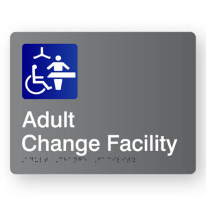 Adult Change Facility Braille sign in Grey Acrylic. Grey Sign panel with Blue & White Changing places Symbol & White text that reads Adult Change Facility