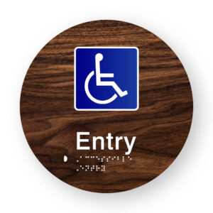 Accessible Entry Braille Sign on a Tactile Printed Dark Woodgrain Acrylic Disk