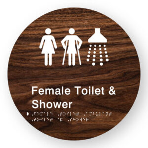 Female Toilet Ambulant Toilet & Shower Braille Sign on a Tactile Printed Dark Woodgrain Acrylic Disk - Image 1