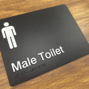 Male Toilet Black Moulded Acrylic Braille Sign. Black Sign panel white white Male Symbol & Text that reads Male Toilet