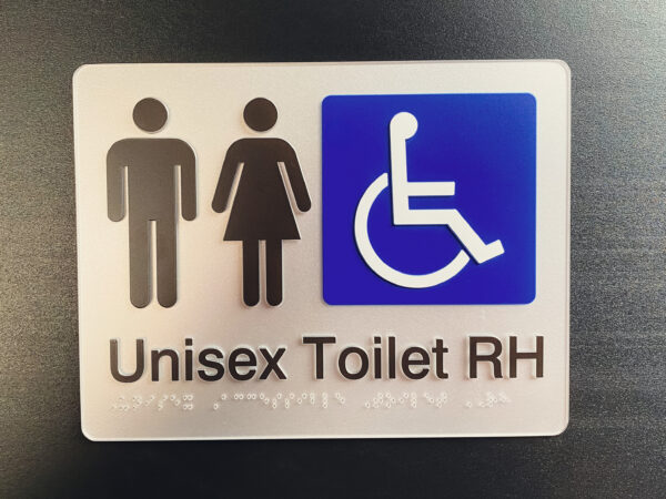 Unisex Accessible Toielt RH Braille Sign in Silver Moulded Acrylic. Silver Sign panel with Black Male & Female Symbols, Blue & White international Symbol for Access. Black Text reads Unisex Toilet RH