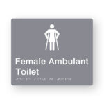 Female Ambulant Toilet Braille Sign in Grey Tactile Printed Acrylic. Grey Sign panel with White Female Ambulant Symbol. White text reads Female Ambulant Toilet. White Braille Text is shown
