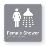Female Shower Braille Sign in Grey Tactile printed Acrylic. Grey Sign panel with white Female & Shower Symbols. White Text reads Female Shower. White Braille Text is shown