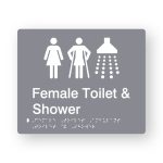 Female Toilet & Shower Braille Sign in tactile printed Grey Acrylic. Grey Sign panel with White Female, Female Ambulant & Shower Symbols. White text reads Female Toilet & Shower. White Braille is shown