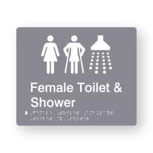 Female Toilet & Shower Braille Sign in tactile printed Grey Acrylic. Grey Sign panel with White Female, Female Ambulant & Shower Symbols. White text reads Female Toilet & Shower. White Braille is shown