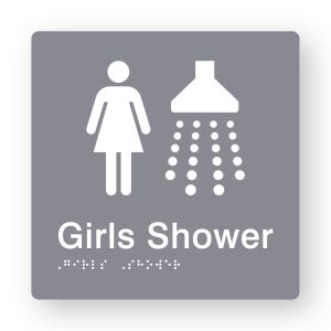 Girls Shower Braille Sign in Grey Tactile Printed Acrylic. Grey Sign Panel with white Female & Shower Symbols. White Text reads Girls Shower. White Braille Text is shown
