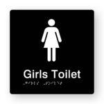 Girls Toilet Braille Sign in Tactile printed Black Acrylic. Black Sign panel with White female Symbol. White text reads Girls Toilet. White braille text is shown.