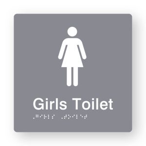 Girls Toilet Braille Sign in Grey Tactile Printed Acrylic. Grey Sign Panel with white Female Symbol. White Text reads Girls Toilet. White Braille Text is shown