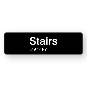 Stairs Braille Sign in Tactile Printed Black Acrylic. Black Sign Panel with White Text that reads Stairs. White Braille Text is shown