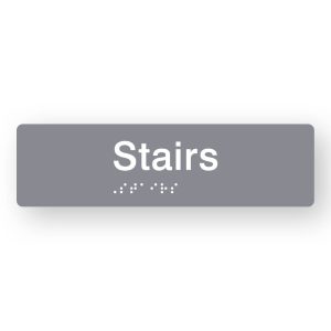 Stairs Braille Sign in Tactile printed Grey Acrylic. Grey Sign panel with White Text that reads Stairs. Black Braille is shown