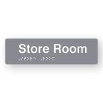 Store Room Braille Sign in Tactile printed Grey Acrylic. Grey Sign panel with White Text that reads Store Room. Black Braille is shown