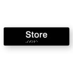 Store Braille Sign in Tactile Printed Black Acrylic. Black Sign Panel with White text that reads Store, White Braille is shown