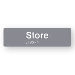 Store Braille Sign in Tactile printed Grey Acrylic. Grey Sign panel with White Text that reads Store. Black Braille is shown