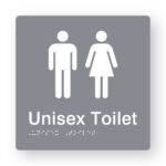 Unisex Toilet Braille Sign in Grey Tactile Printed Acrylic. Grey Sign panel with White Male & Female Symbols. White text reads Unisex Toilet. White Braille Text is shown