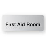 First Aid Room Braille sign in Silver Acrylic. Silver Sign panel with Black text that reads First Aid Room