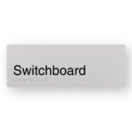 Switchboard Braille Sign in Anodised Aluminium. Silver Sign panel with black text that reads Switchboard