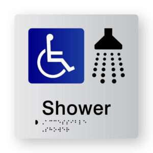 Accessible Shower Braille Sign in tactile printed Silver Acrylic. Silver Sign panel with Blue & White Accessible Symbol & Black Shower Symbol. Black text reads Shower. Black Braille text is Shown
