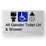 All Gender Accessible Toilet LH & Shower Braille Sign in Tactile Printed Silver Acrylic. Silver Sign panel with Blue & White Accessible Symbol, Black Toilet & Shower Symbol. Black text reads All Gender Toilet LH & Shower. Black Braille Text is shown