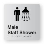 Male Staff Shower Braille Sign in Tactile Printed Silver Acrylic. Silver Sign panel with Black Male & Shower Symbol. Black text reads Male Staff Shower. Black Braille Text is shown