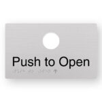 Push to open (Version 2) Braille Sign in Anodised Aluminium. Silver Sign panel with Button hole cut out. Black text reads "Push to Open". Braille text is shown