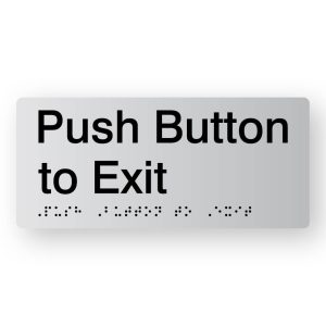 Push Button to Exit Braille Sign in Tactile printed Silver Acrylic. Silver Sign Panel with Black Text that reads Push Button to Exit. Black Braille text is shown