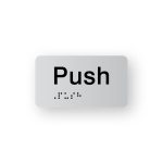Push Braille Sign in Tactile Printed Silver Acrylic. Black sign panel with the word "Push". Black Braille text is shown