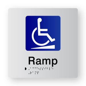 Accessible Ramp Braille Sign, Tactile printed in Silver Acrylic. Silver Sign panel with Blue & White Accessible Symbol. Black Text reads Ramp. Black Braille text is shown.