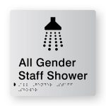 All Gender Staff Shower Braille Sign in Tactile Printed Silver Acrylic. Silver Sign panel with Black Shower Symbol. Black text reads All Gender Staff Shower, Black Braille text is shown