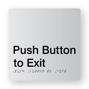 Push Button to Exit Braille Sign in Tactile printed Silver Acrylic. Silver Sign Panel with Black Text that reads Push Button to Exit. Black Braille text is shown