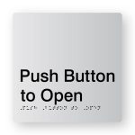 Push Button to Open Braille Sign in Tactile printed Silver Acrylic. Silver Sign Panel with Black Text that reads Push Button to Open. Black Braille text is shown