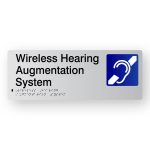 Wireless Hearing Augmentation System Braille Sign in Tactile Printed Acrylic. Silver Sign panel with Blue & White Hearing Symbol. Black text reads Wireless Hearing Augmentation System. Black Braille text is shown
