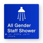 All Gender Staff Shower Braille Sign in Tactile printed Acrylic. Blue Sign panel with White Shower Symbol & Text that reads All Gender Staff Shower. White Braille Text is shown