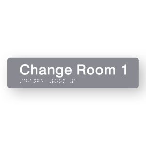Change Room 1 Braille Sign in Tactile printed Grey Acrylic. Grey Sign panel with White Text that reads Change Room 1. White Braille is shown