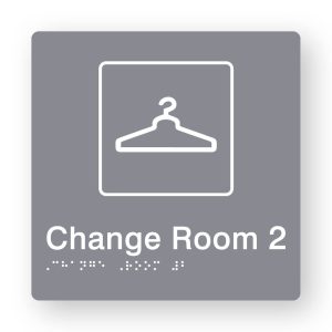 Change Room 2 Braille Sign in Tactile printed Grey Acrylic. Grey Sign panel with White Coat Hanger Symbol & Text that reads Change Room 2. White Braille is shown