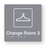 Change Room 3 Braille Sign in Tactile printed Grey Acrylic. Grey Sign panel with White Coat Hanger Symbol & Text that reads Change Room 3. White Braille is shown