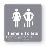 Female Toilets Braille Sign in Tactile printed Grey Acrylic. Grey Sign panel with White Female & Female Ambulant Symbols. White text reads Female Toilets. White Braille is shown