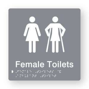 Female Toilets Braille Sign in Tactile printed Grey Acrylic. Grey Sign panel with White Female & Female Ambulant Symbols. White text reads Female Toilets. White Braille is shown