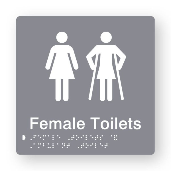 Female Toilets Braille Sign in Tactile printed Grey Acrylic. Grey Sign panel with White Female & Female Ambulant Symbols. White text reads Female Toilets. White Braille is shown