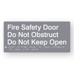 Fire Safety Door Do Not Obstruct Do Not Keep Open Braille Sign in Grey tactile Printed Acrylic. Grey Sign panel with White text & braille
