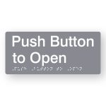 Push Button to Open Braille Sign in Grey Tactile printed Acrylic. Grey Sign panel with White Text reads Push Button to Open. White Braille Text is shown
